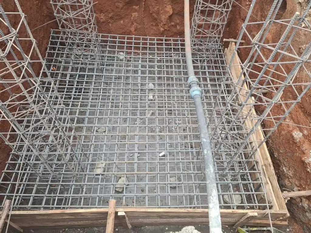 laying concrete foundation for tower